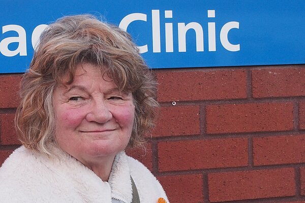 Morag outside clinic